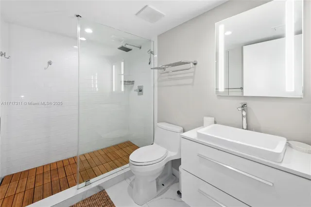 a view of a city with tall buildings