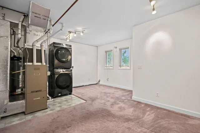 a view of hallway with washer and dryer