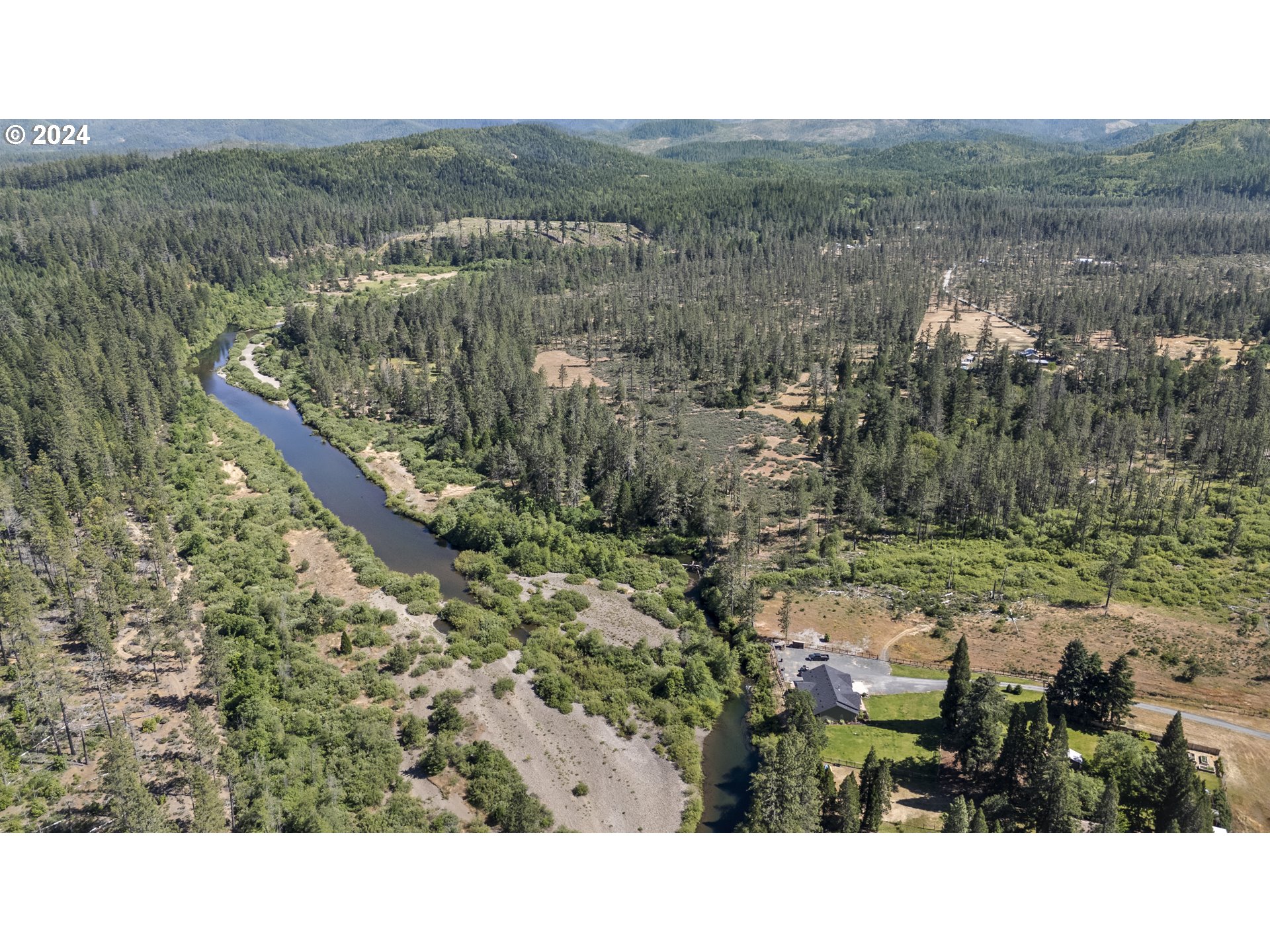 168 Krauss Lane Cave Junction, OR 97523 - Photo 22 of 30 a view of a city from a balcony