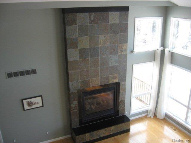 2294 South Hickory Ridge Road Milford, MI 48380 - Photo 11 of 20 VIEW OF LIVING ROOM FROM LOFT.JP