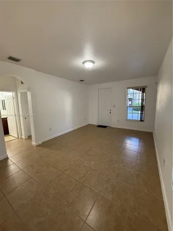 an empty room with an entryway