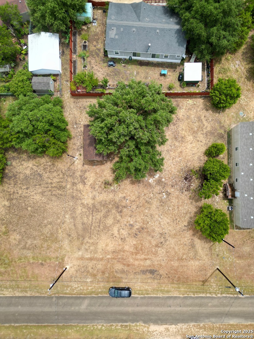 0 Pr 1509 Bandera, TX 78003 - Photo 2 of 8 an aerial view of residential house with car parked