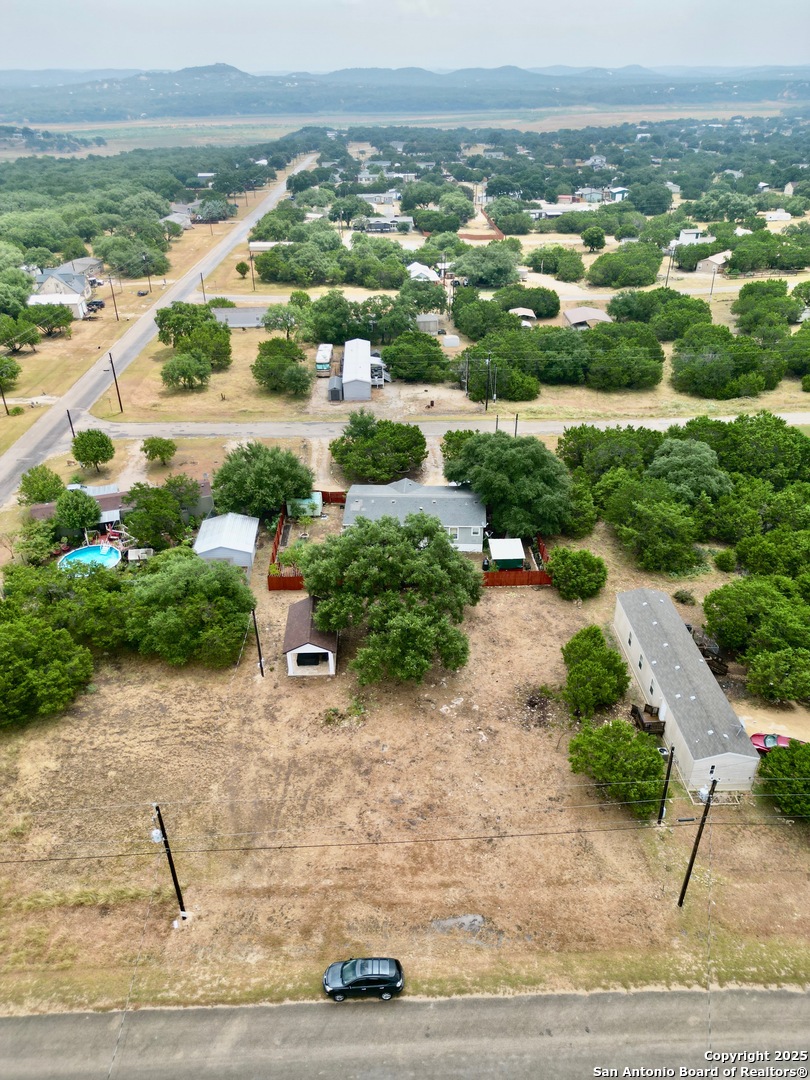0 Pr 1509 Bandera, TX 78003 - Photo 4 of 8 an aerial view of residential houses with outdoor space and trees