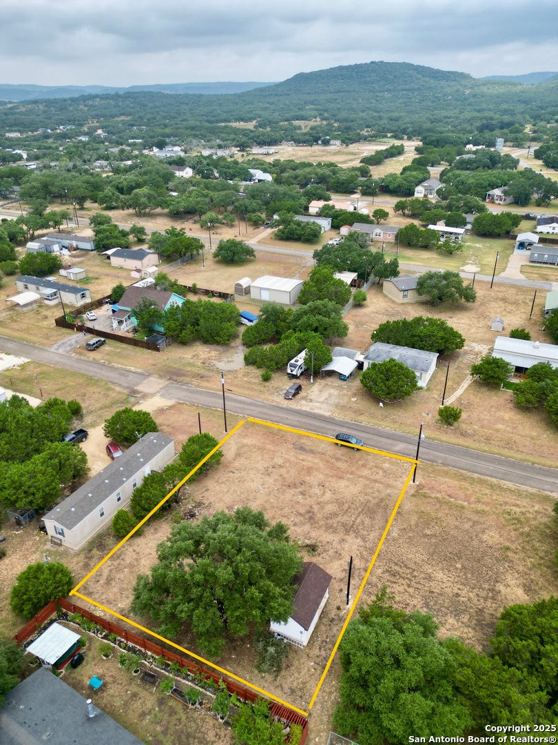 0 Pr 1509 Bandera, TX 78003 - Photo 8 of 8 an aerial view of residential houses with outdoor space