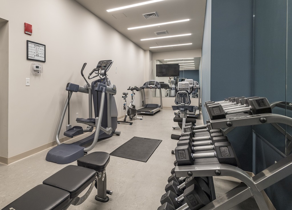 121 Portland Street, Unit 703 Boston, MA 02114 - Photo 12 of 13 a view of a room with gym equipment