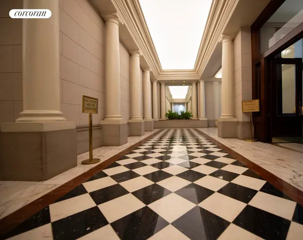 a bathroom with a toilet sink a mirror and bathtub