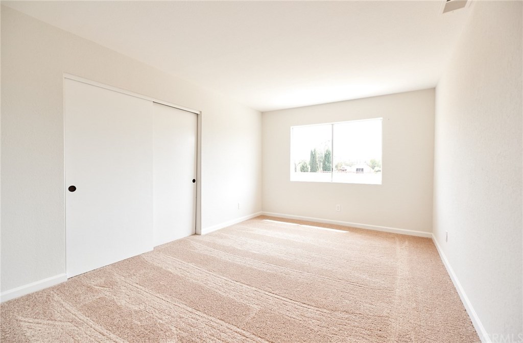 16061 Suttles Drive Riverside, CA 92504 - Photo 12 of 36 a view of an empty room with a window