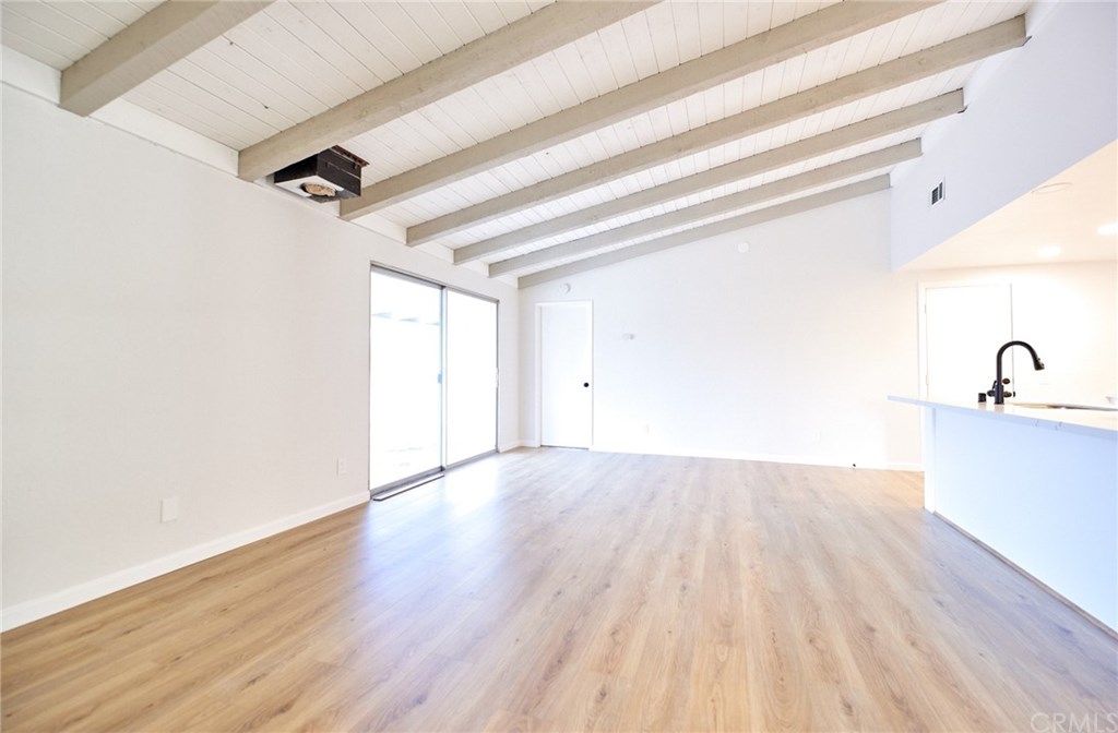16061 Suttles Drive Riverside, CA 92504 - Photo 20 of 36 a view of empty room with wooden floor
