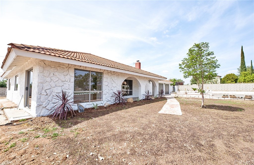 16061 Suttles Drive Riverside, CA 92504 - Photo 2 of 36 a front view of a house with patio