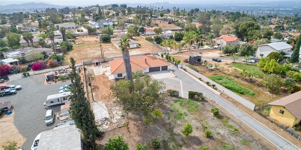 16061 Suttles Drive Riverside, CA 92504 - Photo 33 of 36 an aerial view of residential houses with outdoor space