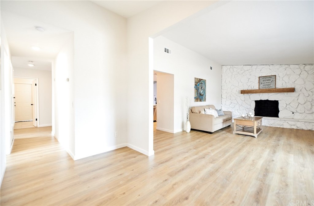 16061 Suttles Drive Riverside, CA 92504 - Photo 4 of 36 a living room with furniture and a fireplace