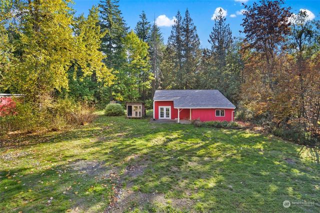 a fire hydrant in the middle of a field