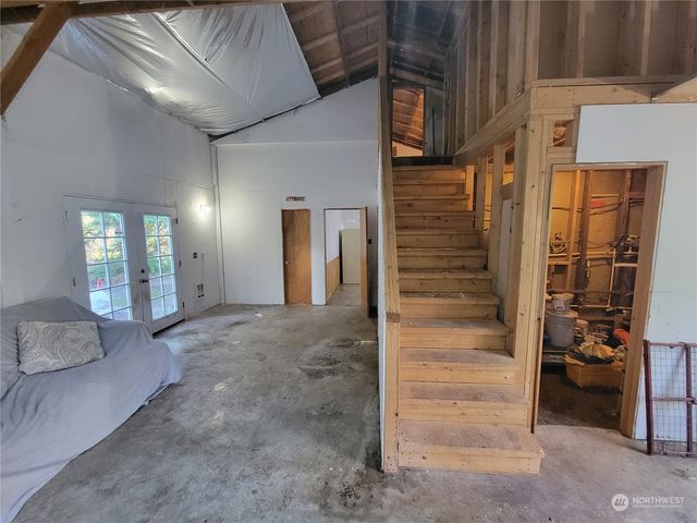 a kitchen with a cabinets and stainless steel appliances