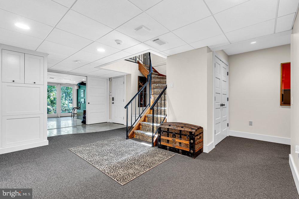 176 Rolling Hill Road Skillman, NJ 08558 - Photo 33 of 44 Inviting entryway from garage w/stylish staircase.