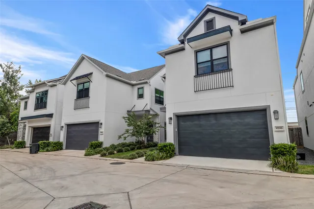 a front view of a house with yard