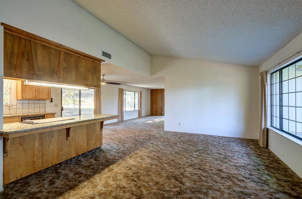 27266 Twin Ponds Road Clovis, CA 93619 - Photo 11 of 45 an empty room with windows