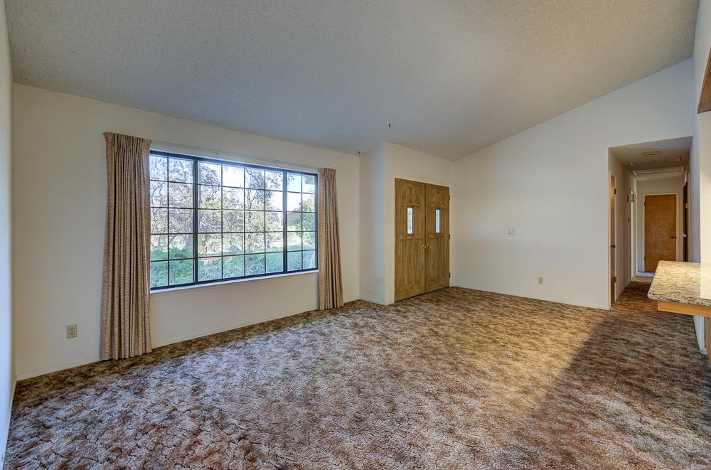 27266 Twin Ponds Road Clovis, CA 93619 - Photo 13 of 45 a view of an empty room and window