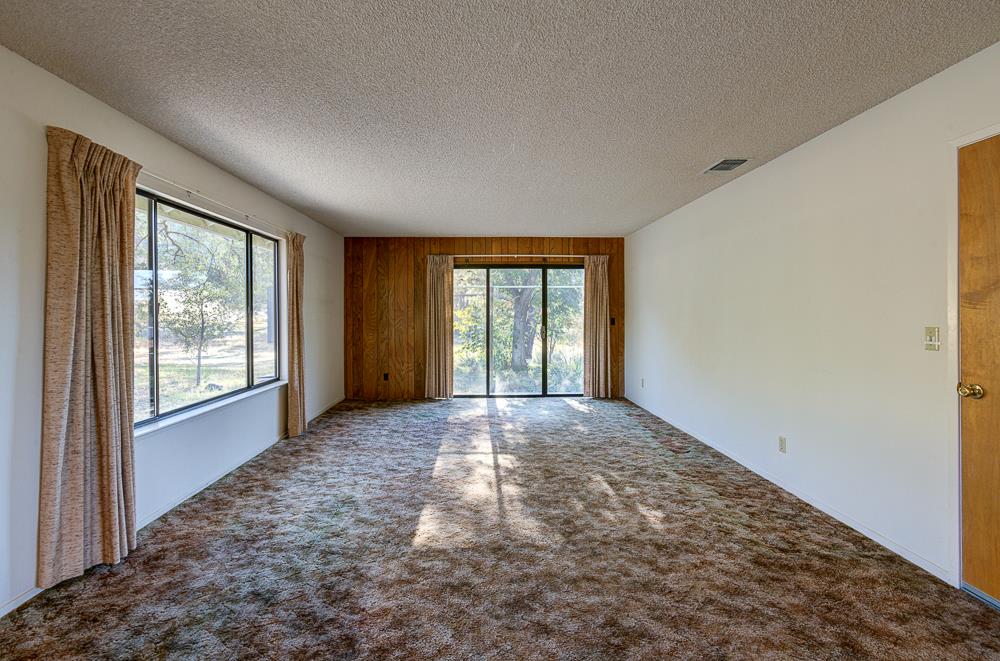 27266 Twin Ponds Road Clovis, CA 93619 - Photo 15 of 45 a view of an empty room with a window