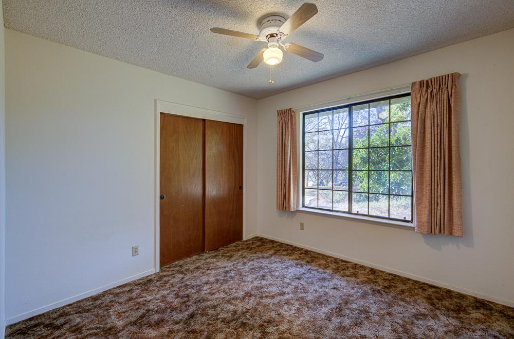 27266 Twin Ponds Road Clovis, CA 93619 - Photo 26 of 45 a view of a bedroom with a natural light