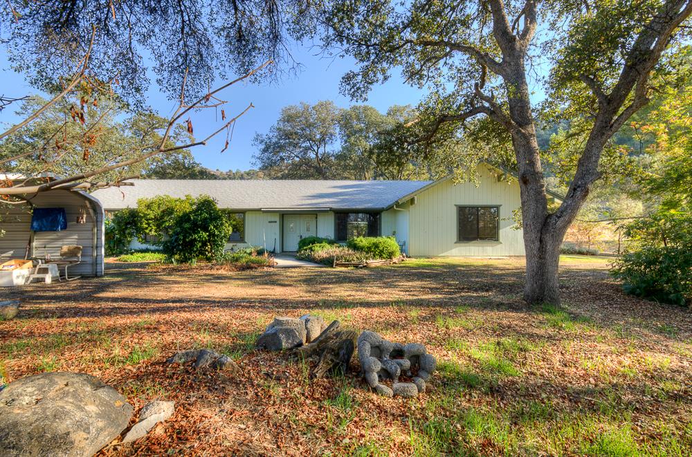 27266 Twin Ponds Road Clovis, CA 93619 - Photo 4 of 45 a view of a house with a yard