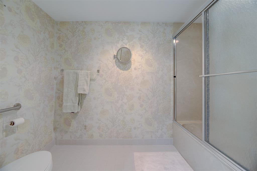 4600 South Ocean Boulevard, Unit 603 Highland Beach, FL 33487 - Photo 15 of 35 a bathroom with a shower