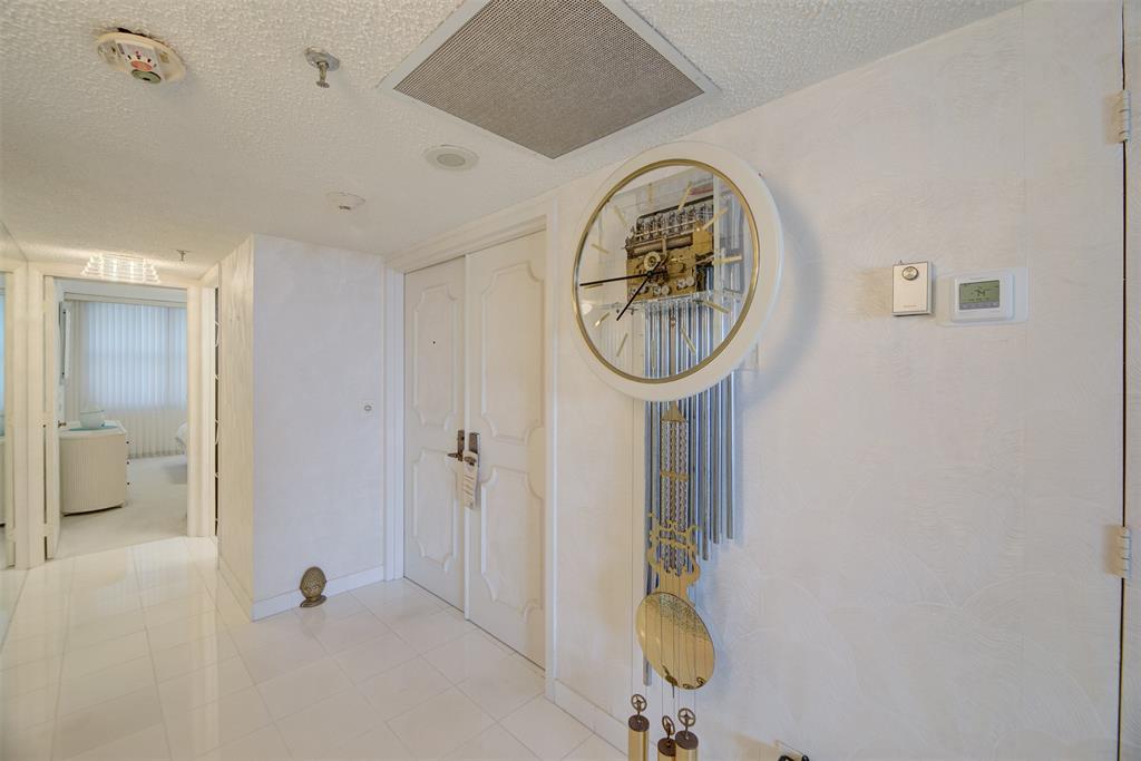 4600 South Ocean Boulevard, Unit 603 Highland Beach, FL 33487 - Photo 19 of 35 a bathroom with a toilet and a mirror