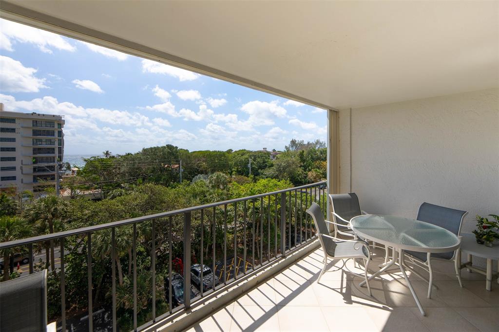 4600 South Ocean Boulevard, Unit 603 Highland Beach, FL 33487 - Photo 20 of 35 a view of a chairs and table in the balcony