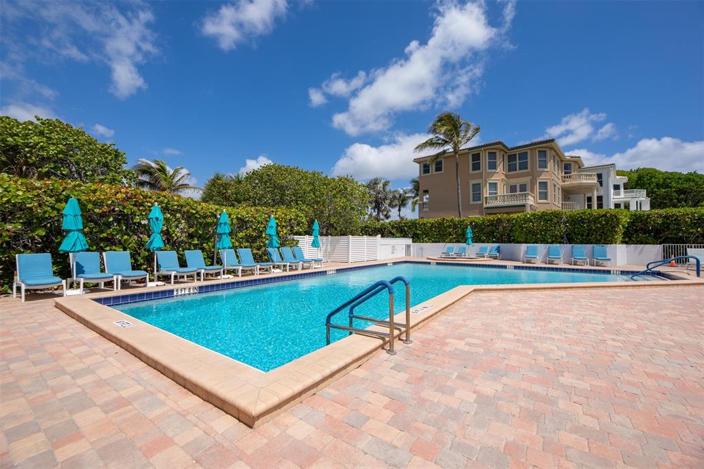 4600 South Ocean Boulevard, Unit 603 Highland Beach, FL 33487 - Photo 21 of 35 a view of swimming pool with outdoor seating and plants