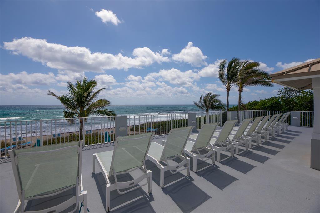 4600 South Ocean Boulevard, Unit 603 Highland Beach, FL 33487 - Photo 27 of 35 a view of a chairs and table in patio