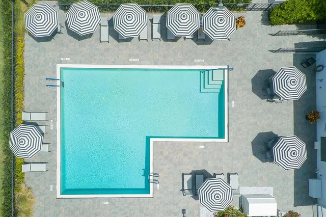 a sign broad in front of the house