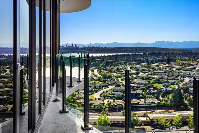 a view of a balcony with city view