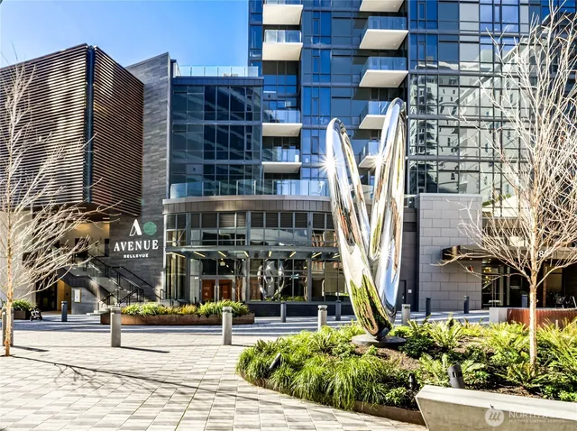 a view of tall building with street view
