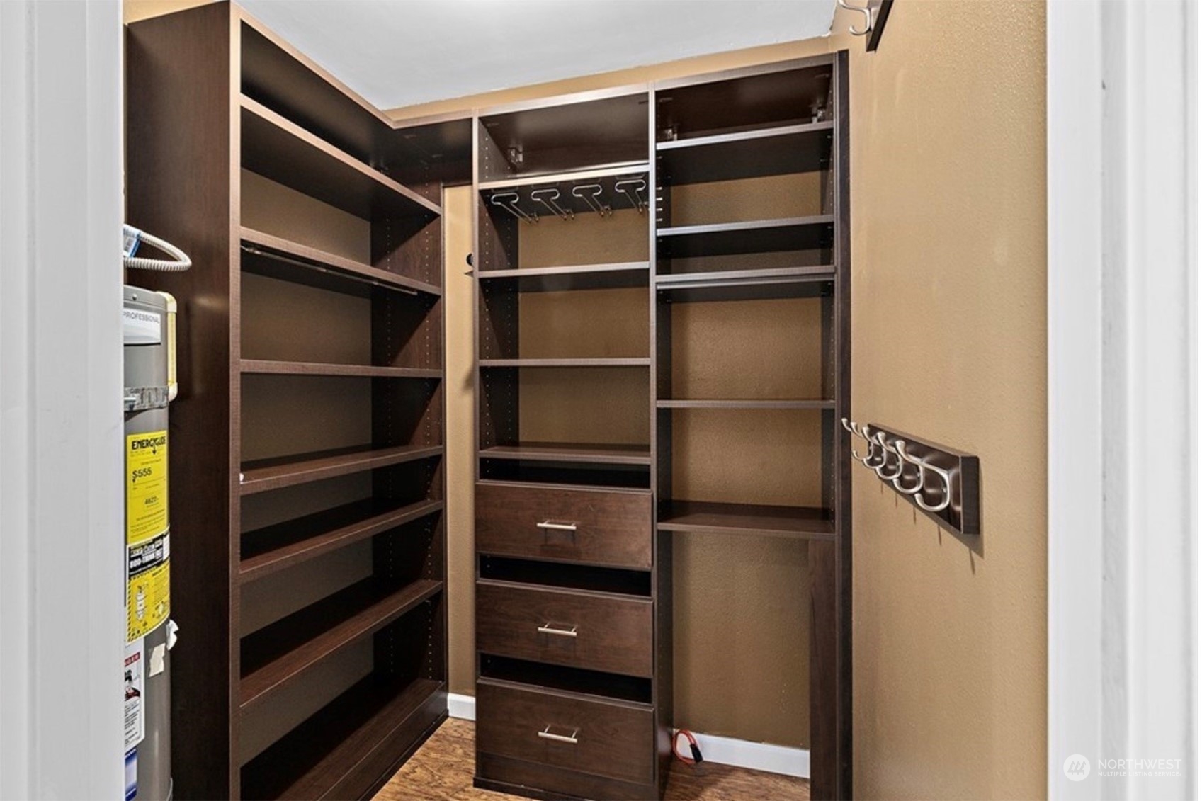 7395 Old Redmond Road, Unit 217 Redmond, WA 98052 - Photo 7 of 16 a view of walk in closet with empty racks