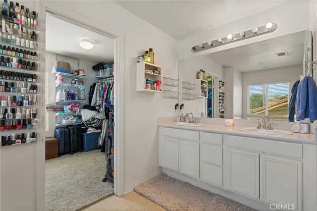 a view of kitchen with stainless steel appliances cabinets and a counter top space