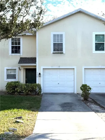 a view of outdoor space yard and front view of a house