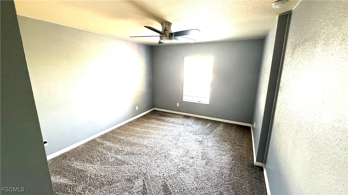 5224 Glenlivet Road Fort Myers, FL 33907 - Photo 13 of 19 an empty room with a window