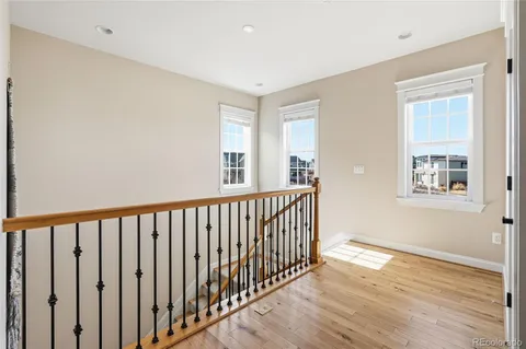a bedroom with bed and a window