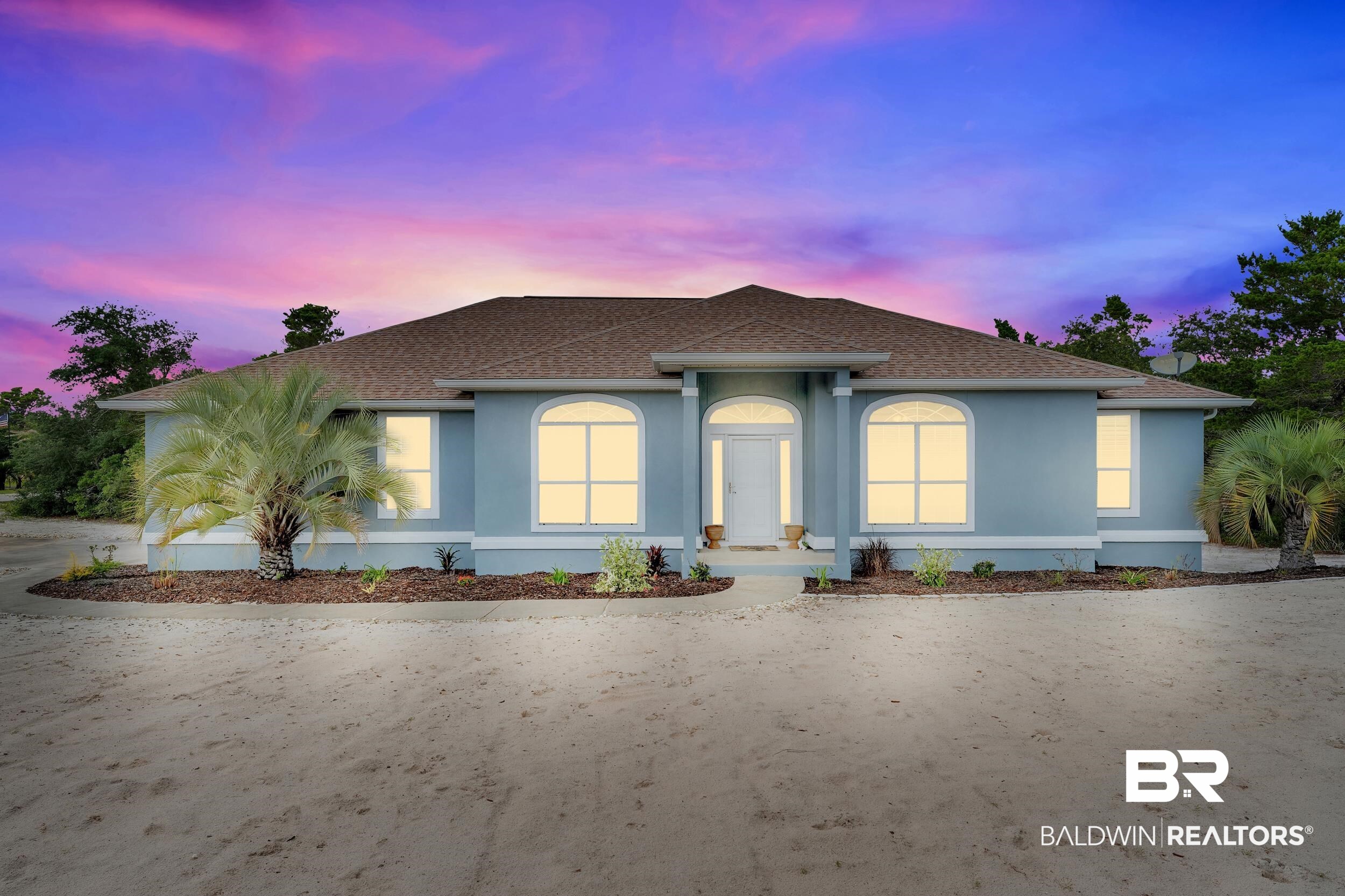 4606 Osprey Drive Orange Beach, AL 36561 - Photo 41 of 44 View of front facade with a shingled roof and stucco siding
