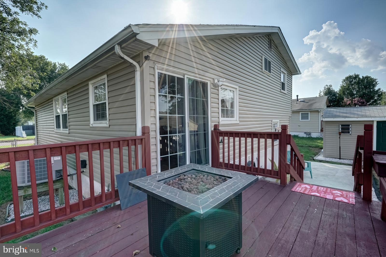 172 Kansas Road Pennsville, NJ 08070 - Photo 14 of 43 Walk from Kitchen sliding doors to the Deck