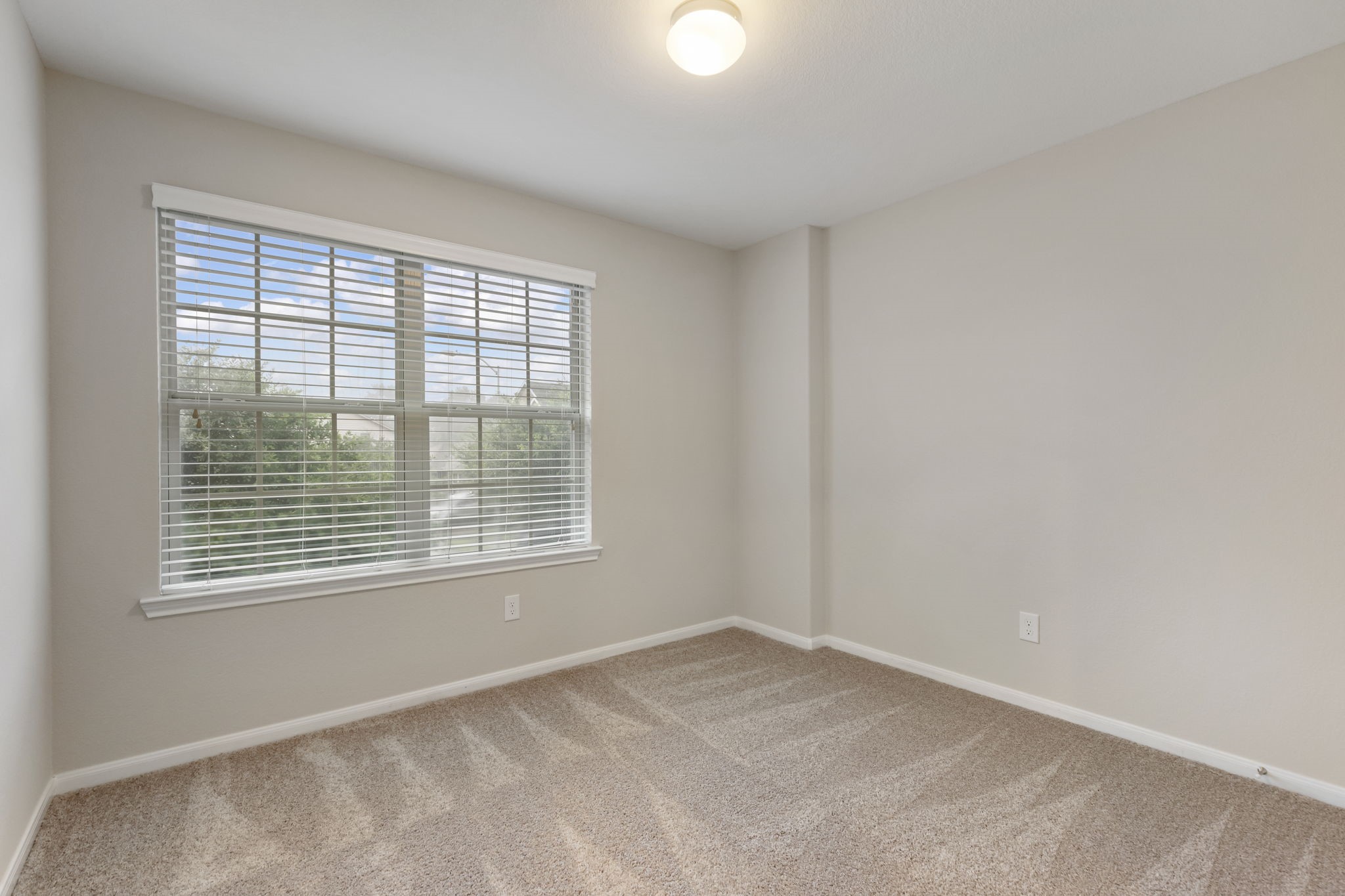 7130 Edwanna Lane Spring, TX 77389 - Photo 22 of 36 One of three secondary bedrooms upstairs.