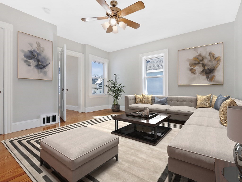 29 Garfield Avenue Boston, MA 02136 - Photo 4 of 27 a living room with furniture and a potted plant