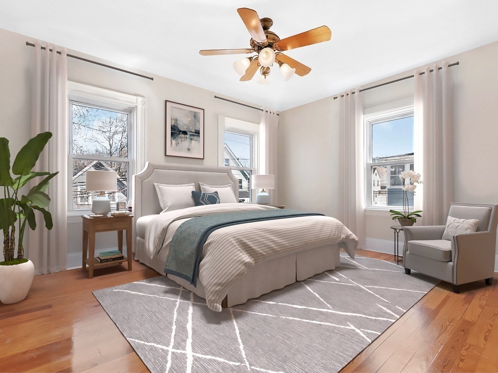 29 Garfield Avenue Boston, MA 02136 - Photo 5 of 27 a bedroom with a large bed and a window