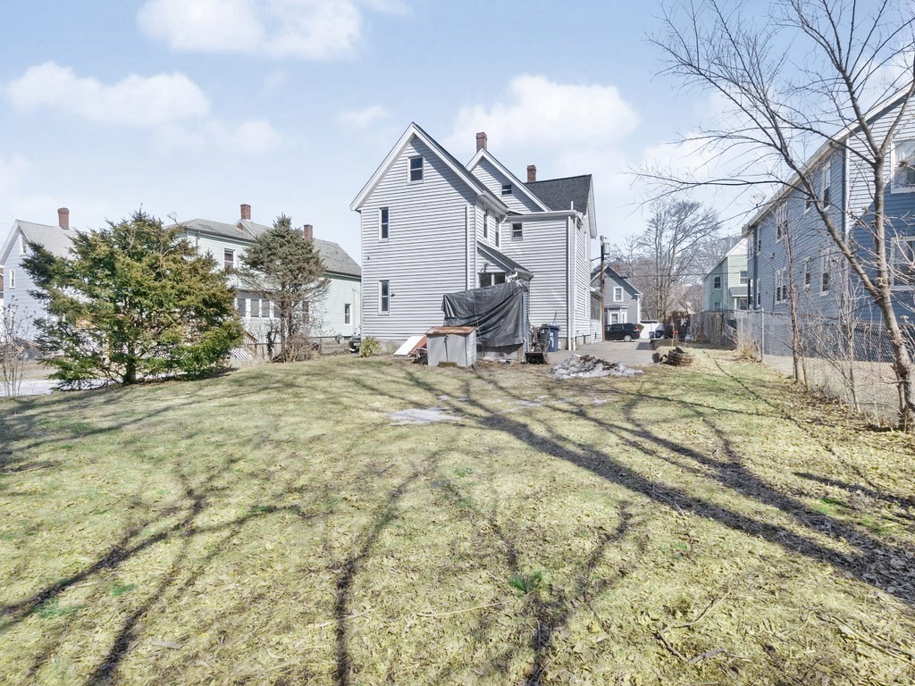 29 Garfield Avenue Boston, MA 02136 - Photo 7 of 27 a view of a house with snow on the background
