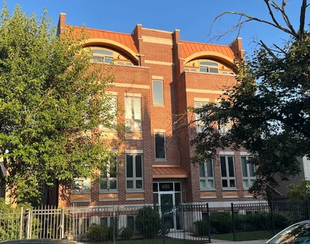 a front view of a residential houses with yard