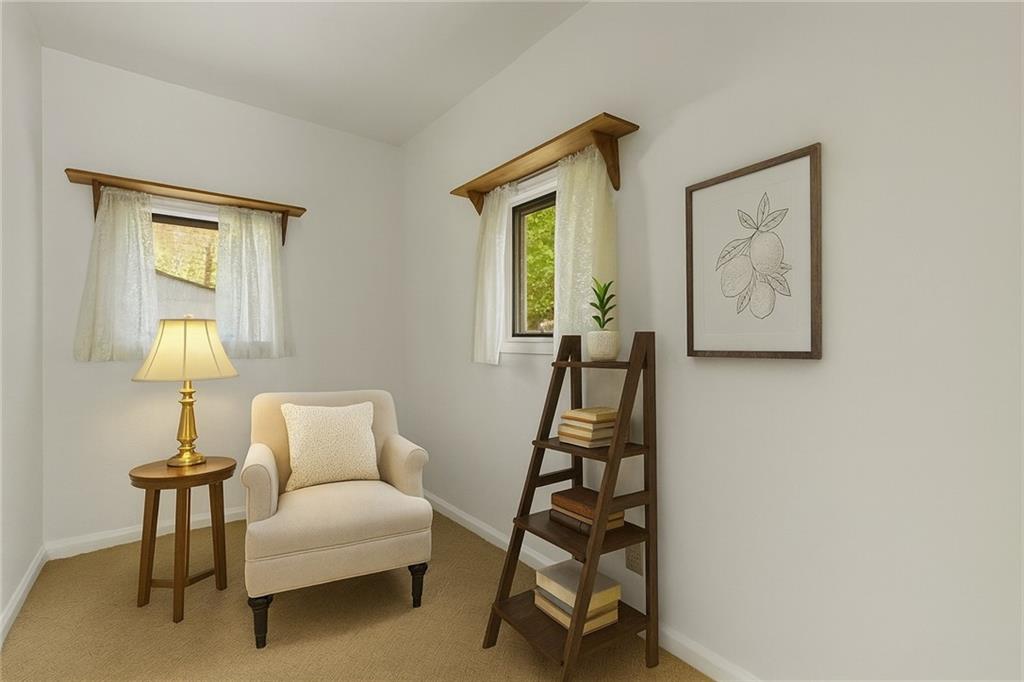 83 Gibson Street Pittsburgh, PA 15202 - Photo 23 of 27 a bedroom with furniture and a wooden floor