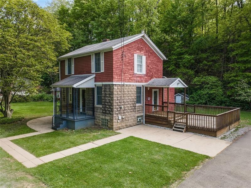 83 Gibson Street Pittsburgh, PA 15202 - Photo 3 of 27 a front view of a house with a garden