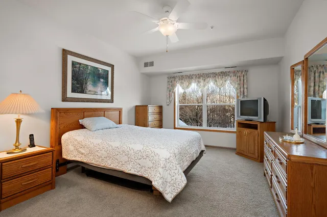 $315,000 | 9165 Comstock Lane North, Unit 204, Maple Grove, MN 55311