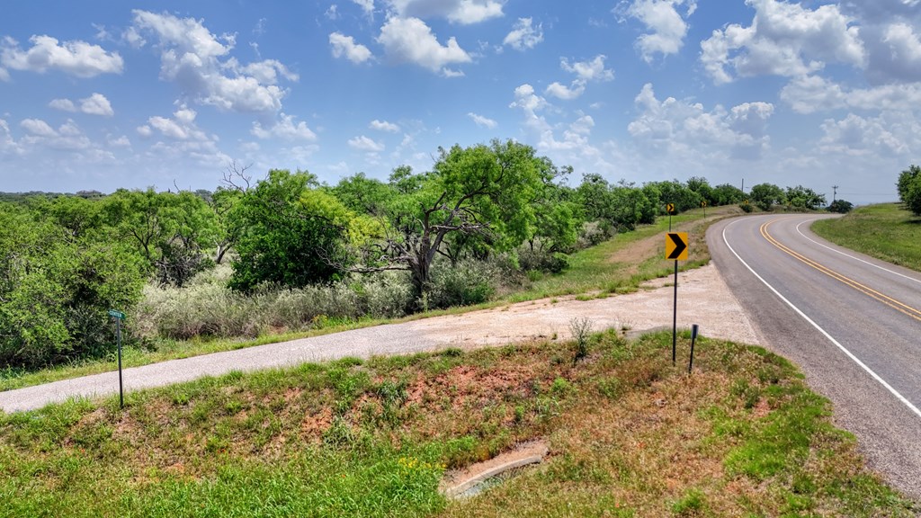 0 West W Highway Valley Spring, TX 76885 - Photo 18 of 27 a backyard of a house with lots of green space
