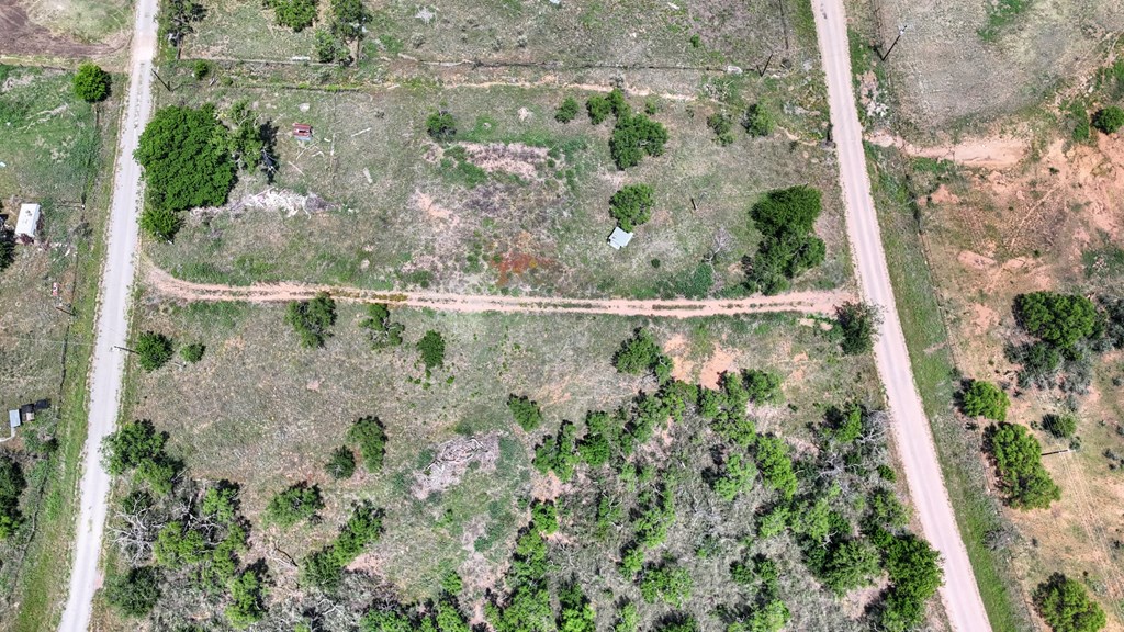 0 West W Highway Valley Spring, TX 76885 - Photo 23 of 27 an aerial view of a houses with a yard