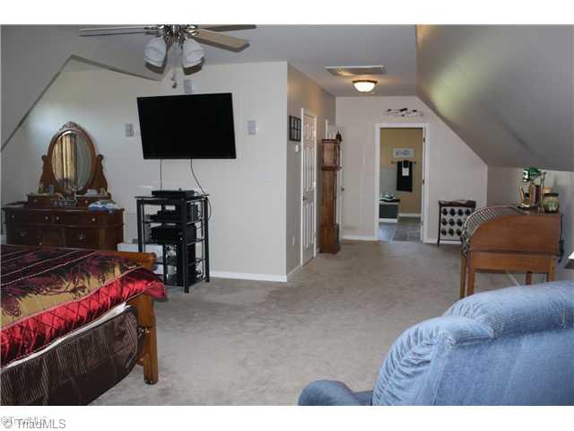 113 Miller Road Mount Airy, NC 27030 - Photo 13 of 16 Bonus. VeryBonusroom on second floor with walk-in closet and large bath at far end. Cou;ld be used as a forth bedroom if the septic system were modified and approved.